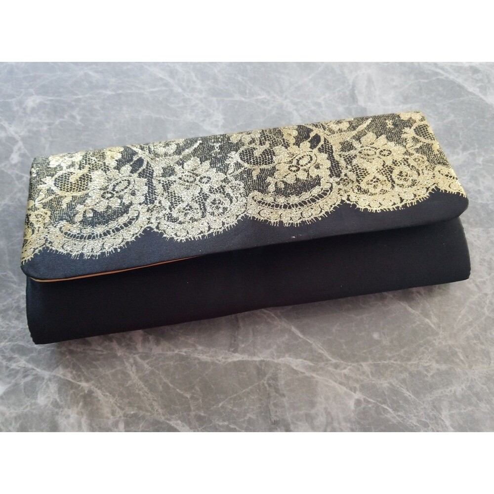 Avon gold glitter and black  clutch new